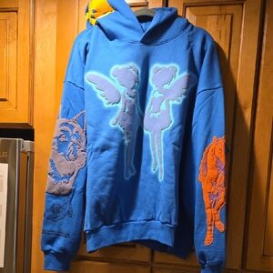 Drake Blue Sweater with Artistic Graphics